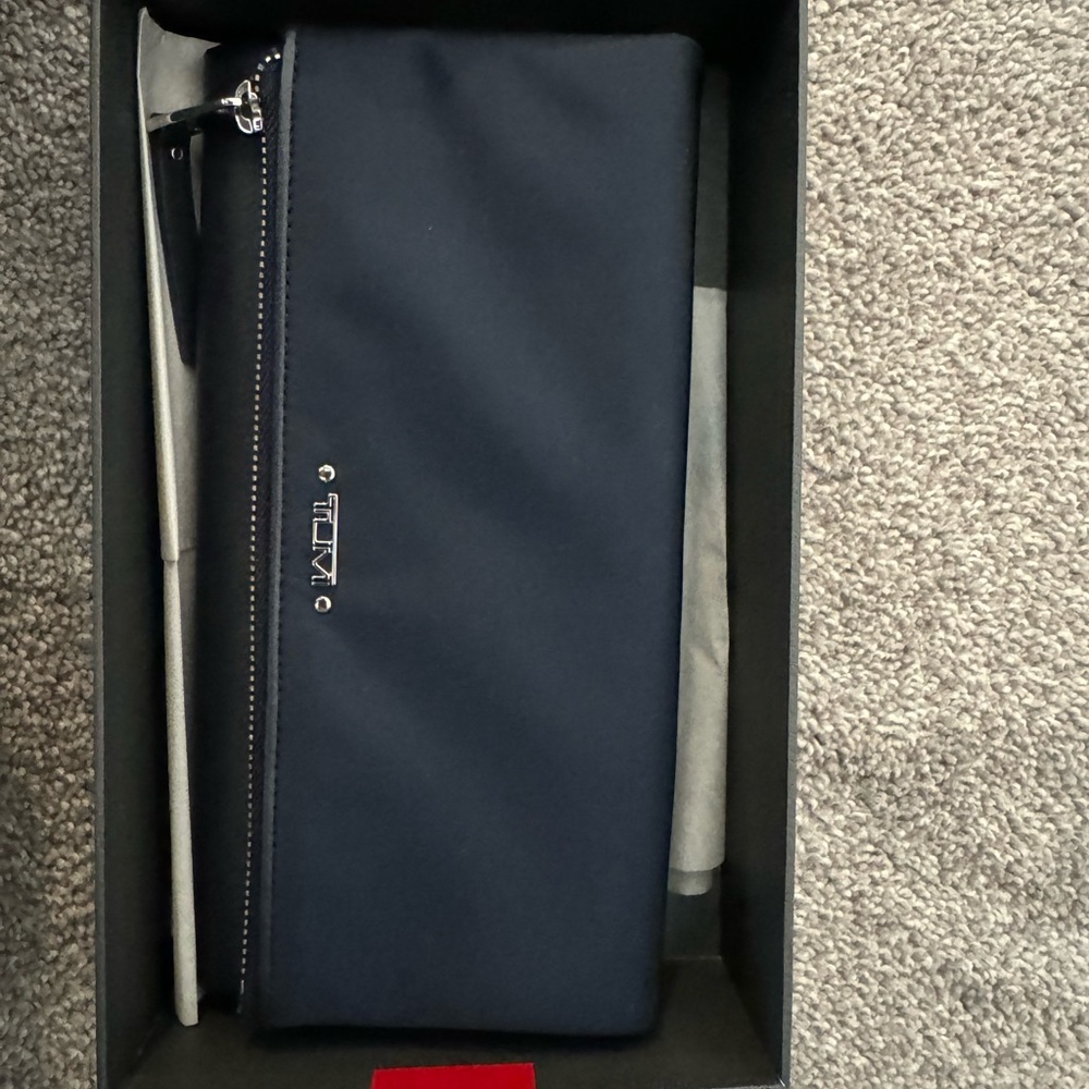 Women’s Navy Tumi wristlet